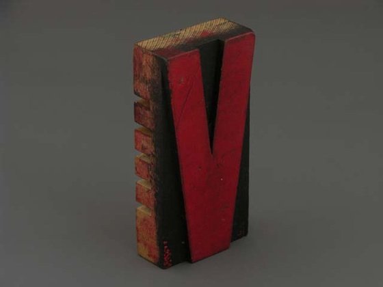 V. Letra de imprenta.